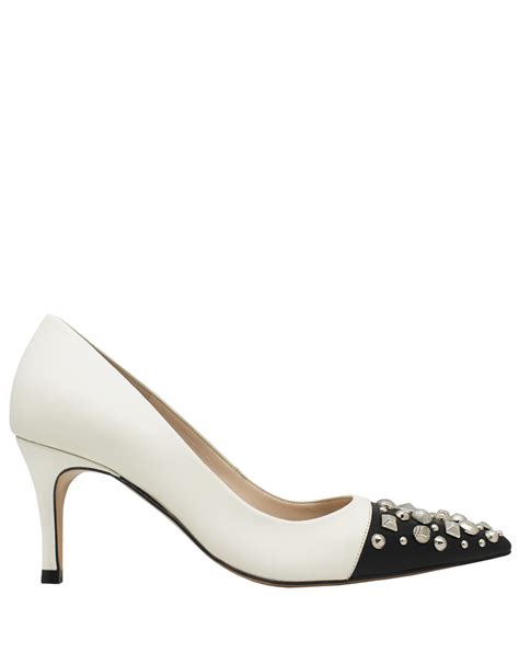 chanel beige black pumps|chanel black and white pumps.